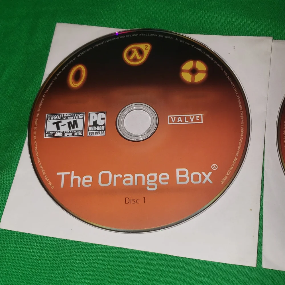 Orange Box for PC Disc 1 and 2 plus quick reference card